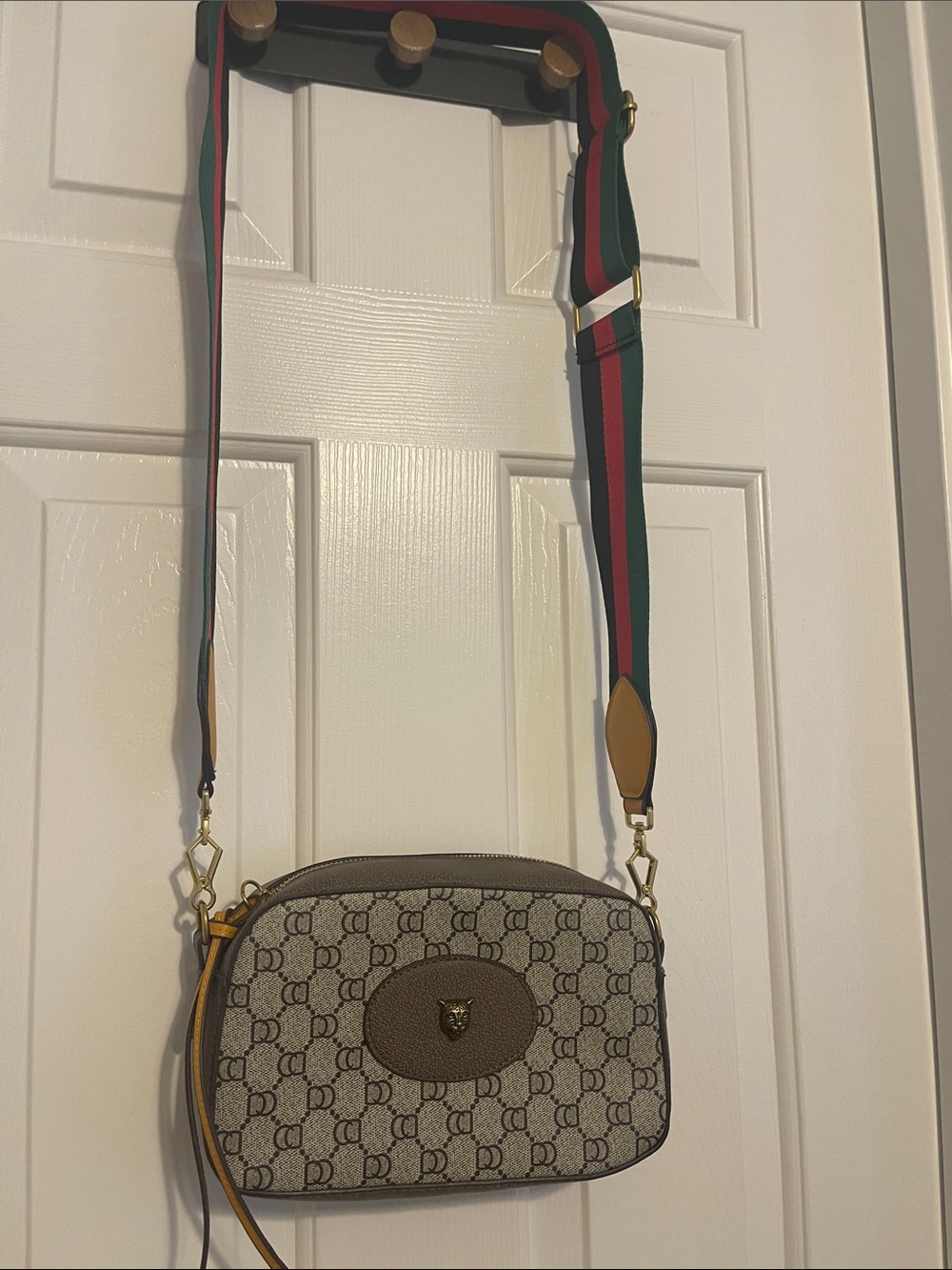 Brown Patterned Crossbody Bag with Green-Red Stripe Strap